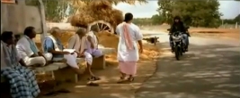 boy on motorbike in Sanskrit only villages