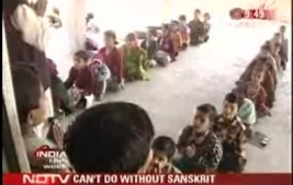 Village children sitting lined up in Sanskrit school